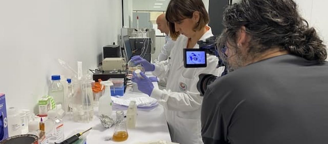 Camera crew films b-roll in laboratory in Basque Country, Spain.